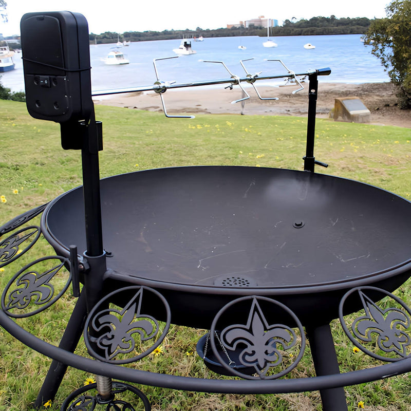 BBQ Grill and Fire Pit close up view of fleur de lis design with rotisserie attached