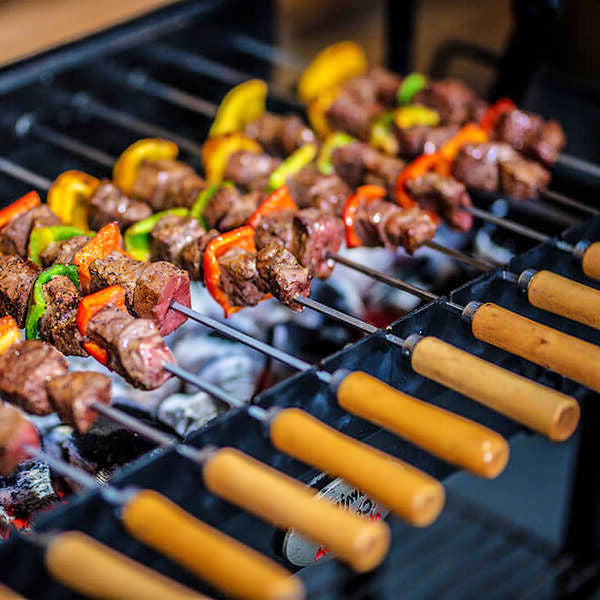 BBQ Spit Roaster | Cyprus | Flaming Coals meat cooking on skewers
