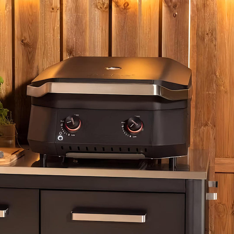 Cozze B-500 Gas BBQ sitting on top of outdoor table