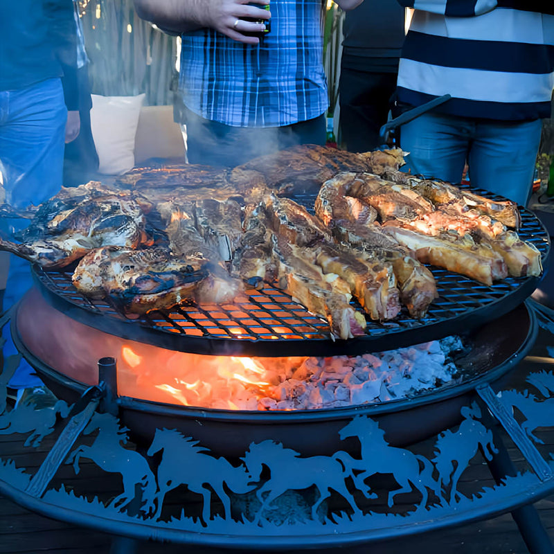 BBQ Grill and Fire Pit  close up view of cowboy design with pork chops cooking ontop