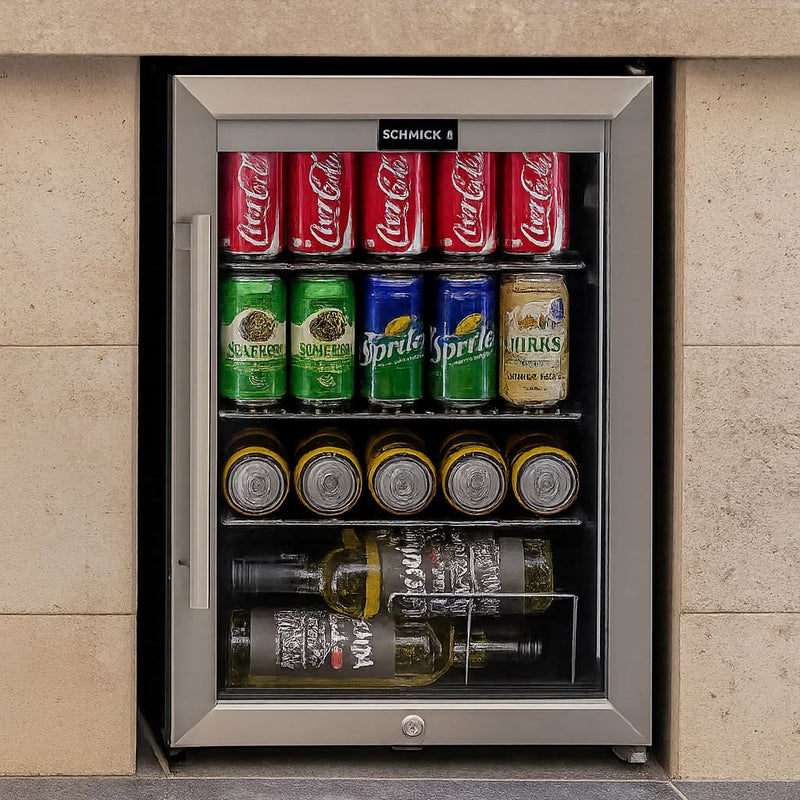 Schmick 70 L Tropical Triple‑Glazed Stainless Bar Fridge – Right or Left Hinge - HUS-SC70-SS built into a sandstone outdoor cabinet