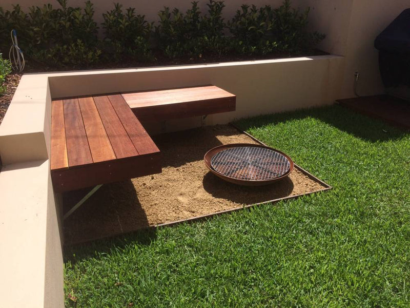 Outdoor Fire Pit: the cauldron hearth with BBQ Grill in outdoor setting with seating