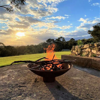 Fire Pit: Mega Cauldron lit with sunset