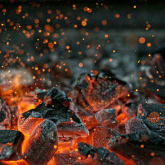 Fire Pit Coals burning. Blog image for BBQ fire pits. Outdoor Living Australia