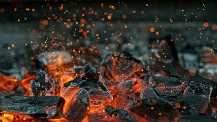 Fire Pit Coals burning. Blog image for BBQ fire pits. Outdoor Living Australia