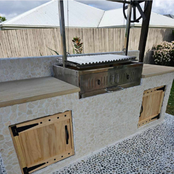 Square image of an outdoor parrilla grill custom built area