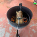 57cm Kettle Rotisserie Kit for the Webber Kettle BBQ top view of roasting lamb with flaming coals