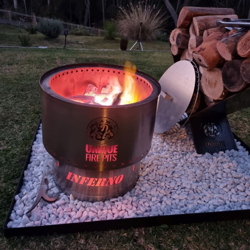 Smokeless Fire Pit With FREE Grill, Lid and Carry Bag showing the 650 mm with fire inside and lid and grill next to it
