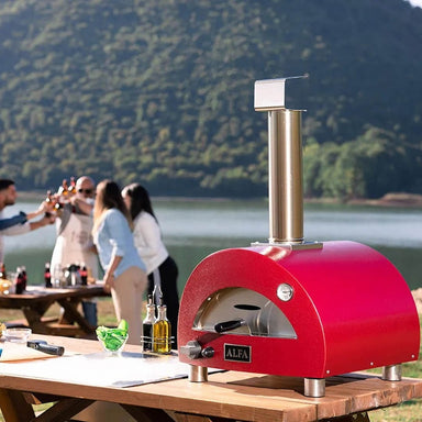 Alfa Moderno Portable Pizza Oven | sitting on table outside with people in background