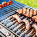 Parrilla BBQ Grill | Argentine | Asado | No Base showing a bbq cooking on the grill