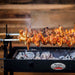BBQ Spit Roaster | Cyprus | Flaming Coals showing meat cooking with no spit attached