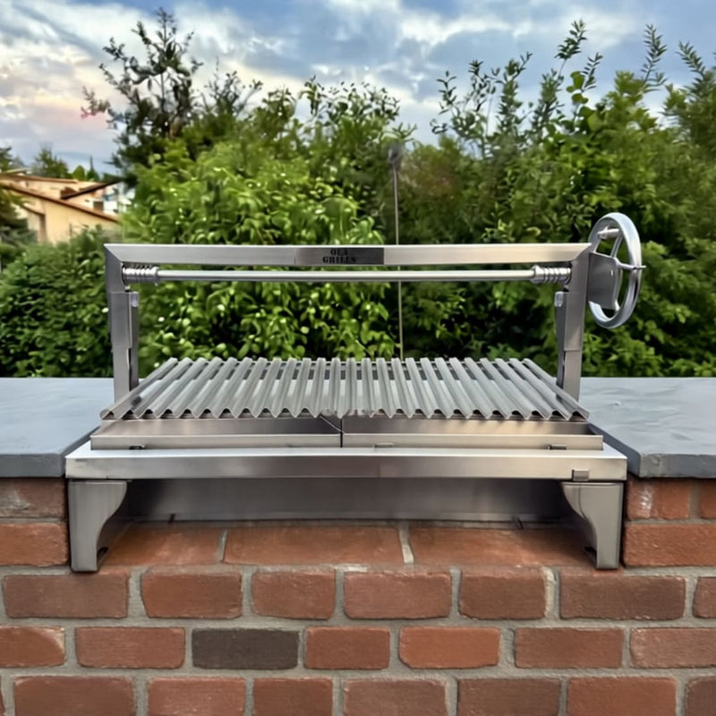 Built-In Parrilla Argentine BBQ Topper | 100% 304 Stainless | V-Grate Model showing it built into a brick outdoor area