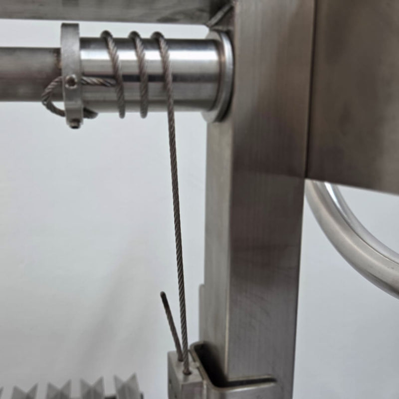 Built-In Parrilla Argentine BBQ Topper | 100% 304 Stainless | V-Grate Model close up of the wheel cable