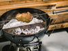 Premium BBQ Rotisserie Kit |  close up view of rotisserie on a SNS grill cooking a pork