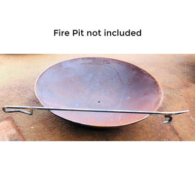 fire pit stoker | poker by outdoor living australia sitting on a fire pit