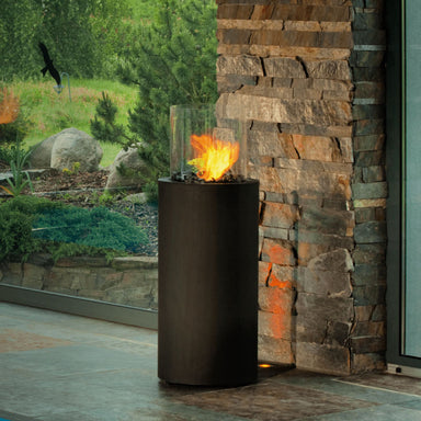 Fireplace Totem Commerce - set up next to slate wall