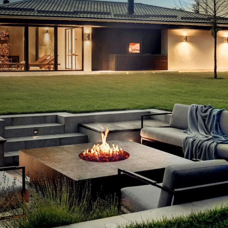 Fireplace | Planika Galio Star Insert built into a recessed outdoor table