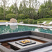 Galio H Insert Fireplace | view of H insert fireplace in backyard next to pool