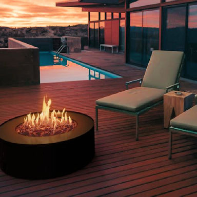 Galio Star Fireplace | sitting on deck with fire going with sunset in background