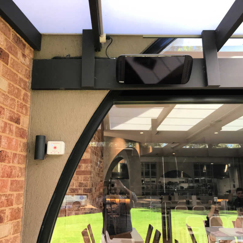Infrared Heater | Outdoor | Electric | Heliosa 66 Black Glass on a patio