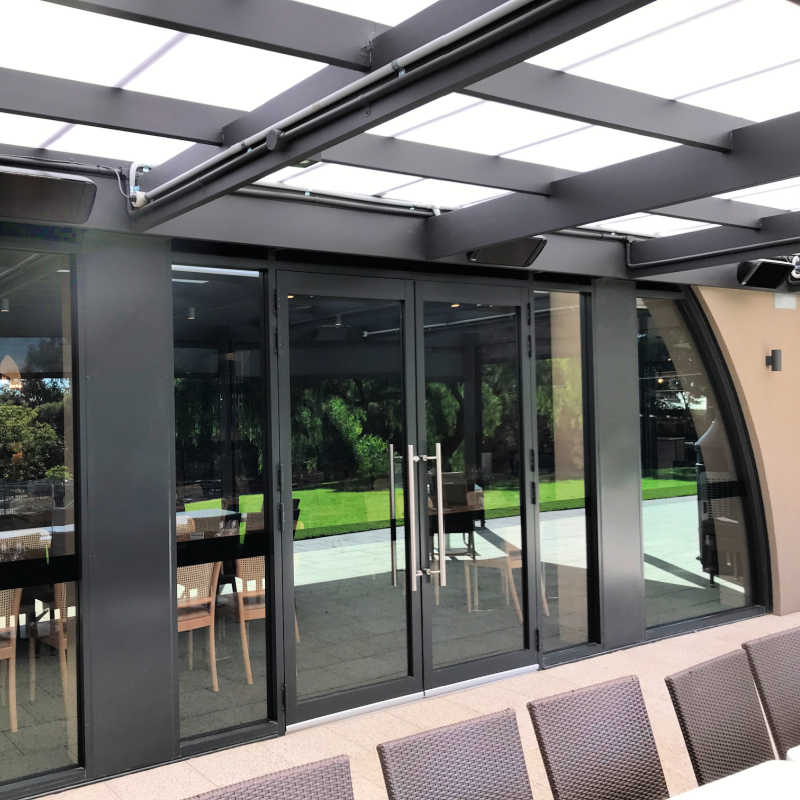 Infrared Heater | Outdoor | Electric | Heliosa 66 Black Glass outside a patio