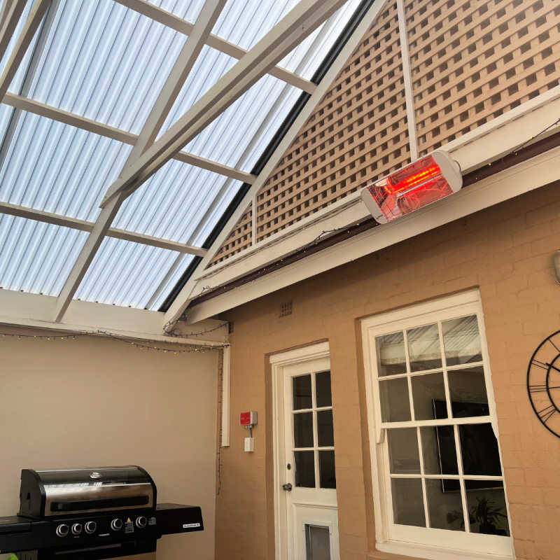 Infrared Heater | Outdoor | Electric | Heliosa 66 outside a house with a bbq