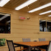 Infrared Heater | Outdoor | Electric | Heliosa 44 on a wall in outsdie dining area