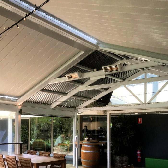 Infrared Heater | Outdoor | Electric | Heliosa 44 outside an undercover area