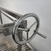 Parrilla Argentine BBQ with Firebricks | 100% 304 Stainless | South American Style Cooking showing the wheel