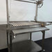 Parrilla Argentine BBQ with Firebricks | 100% 304 Stainless | South American Style Cooking shopwing a close up of the door down and grill down
