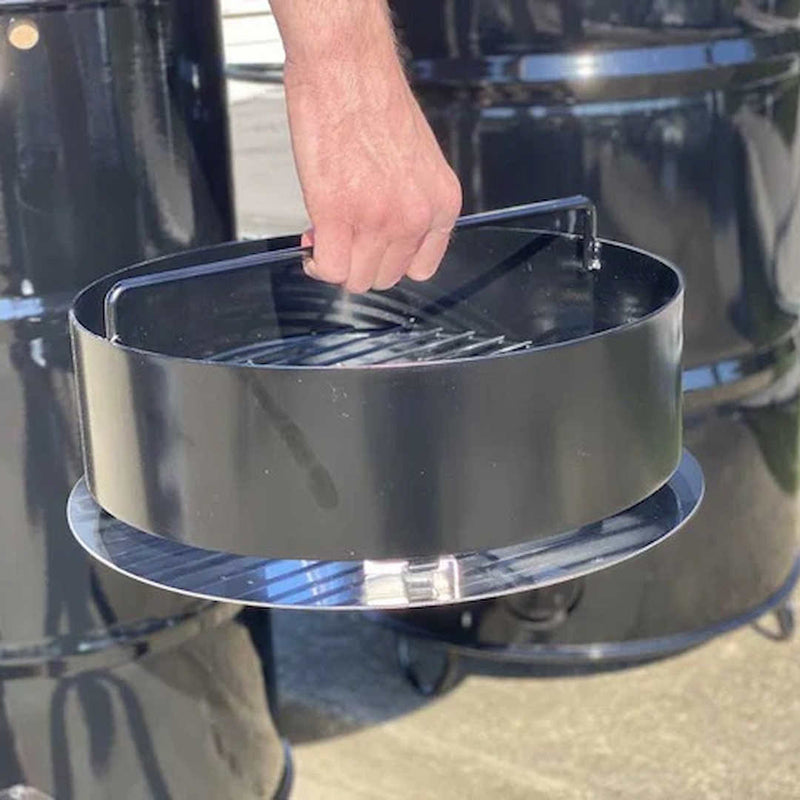 Pit Barrel Cooker Ash Pan close up with man holding outside