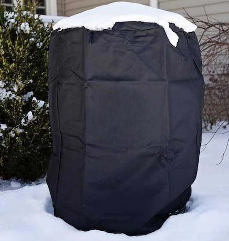 Pit Barrel Cooker Cover outside with snow on it