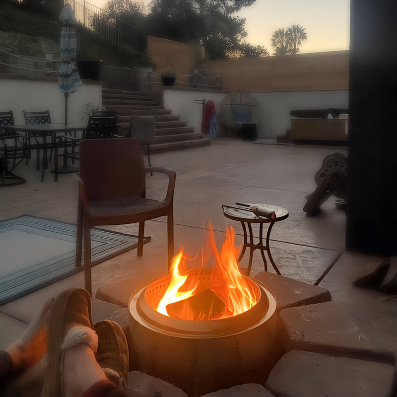Smokeless Fire Pit | built in with a fire inside and people sitting next to it