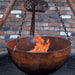 Tripod Fire Pit close up view of fire bowl with fire inside