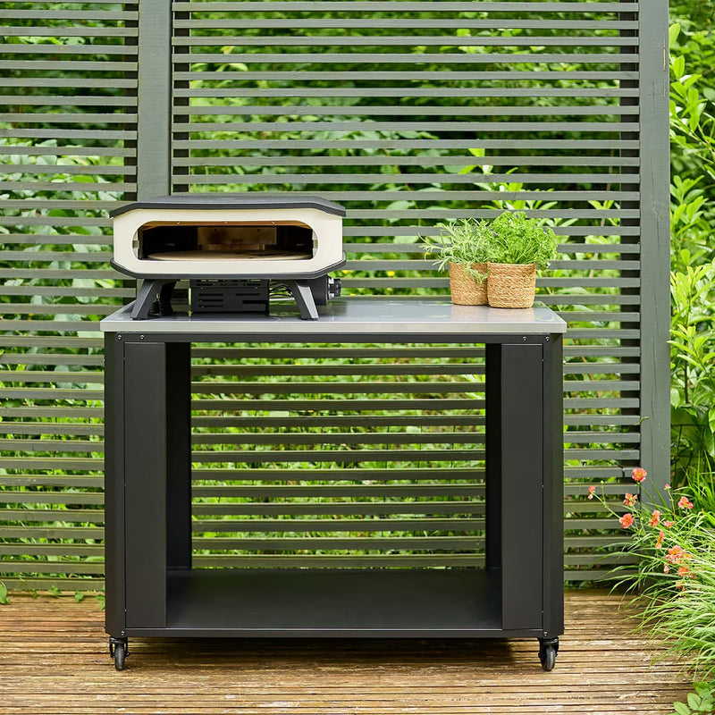 Outdoor Kitchen 115 Open  – Stainless 115×60 Top | Modular | Cozze witha  pizza oven on it in an outdoor area