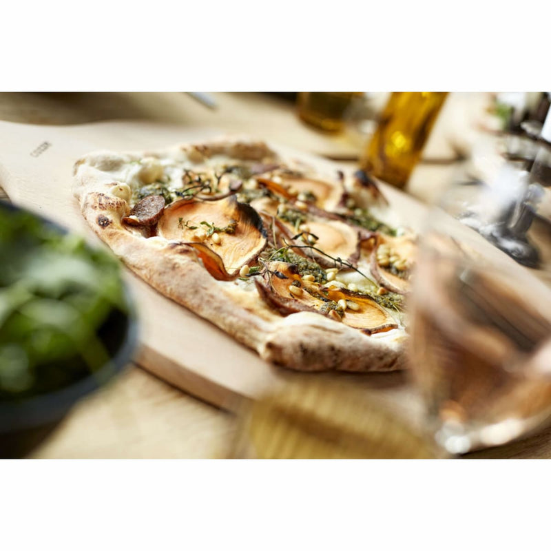 Pizza Oven Premium Rotate Electric 13″ & 17″ — Rotating Stone showing a freshly cookewd pizza