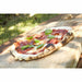 Pizza Oven Premium Rotate Electric 13″ & 17″ — Rotating Stone shoiwng a freshly cooked pizza on a peel