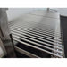 Replacement V-grate & BBQ Rod Grills for OLA Grills Parrilla Argentine showing the bbq rod grill on a  unit