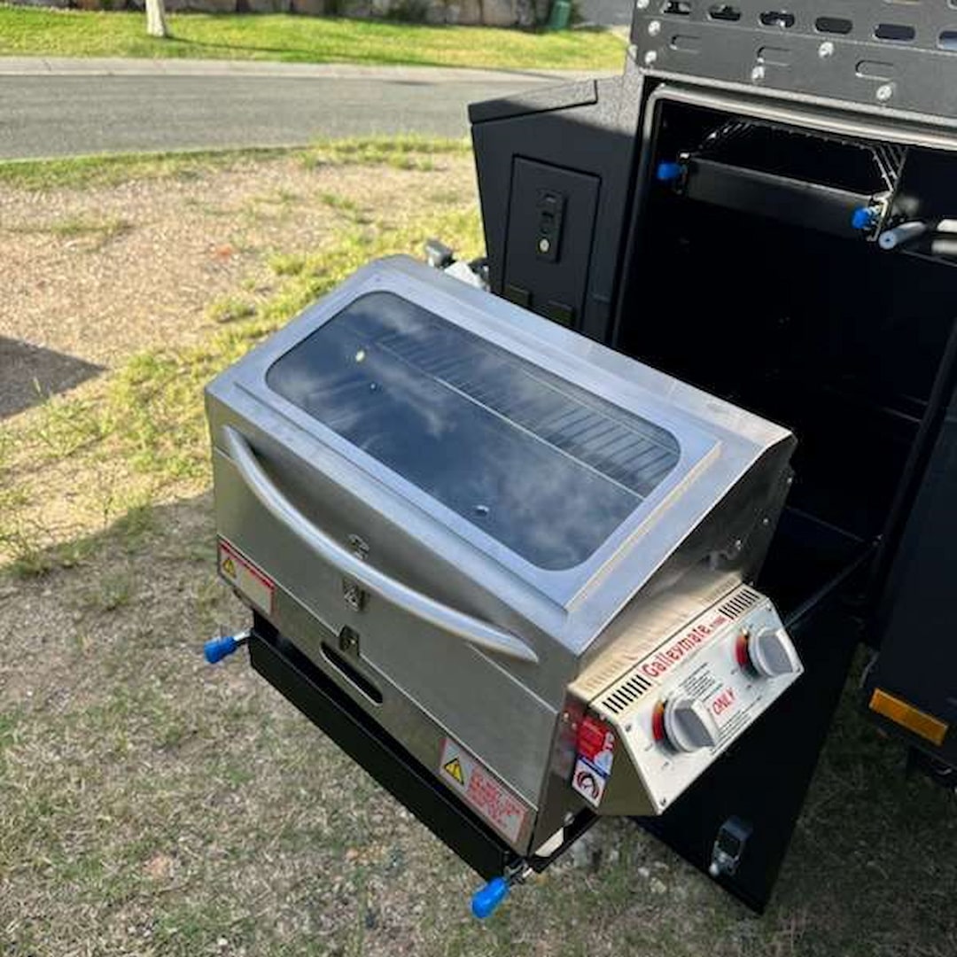 Portable BBQ | Marine | Galleymate & Sizzler BBQ on a RV boot slide locked into place