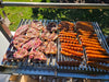 Parrilla Argentine BBQ with Firebricks | 100% 304 Stainless | South American Style Cooking showing it full of meat