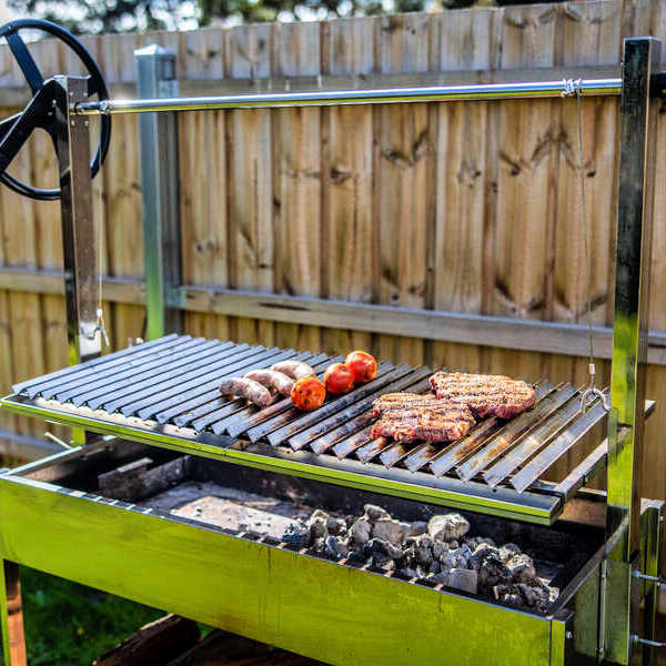Argetine Parrilla BBQ Grill | Outdoor Central from Outdoor living australia  side view with wheel showing