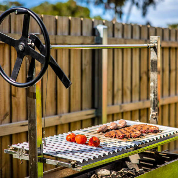 Argetine Parrilla BBQ Grill | Outdoor Central from Outdoor living australia  side view with food on it