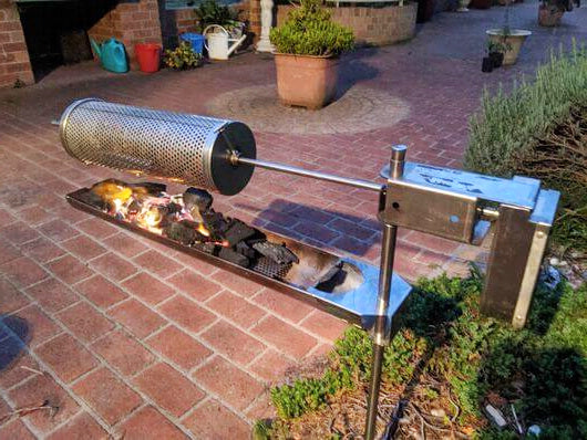 Auspit Gold: Portable Spit Rotisserie Package cooking over pit