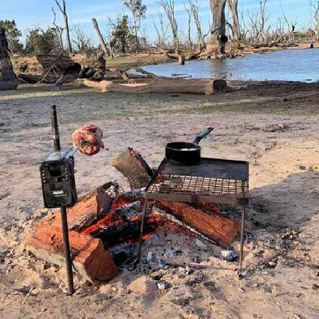 Products Auspit Portable Compact Camping Spit Rotisserie cooking near river