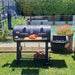 BBQ Offset Smoker Flaming Coals in backyard
