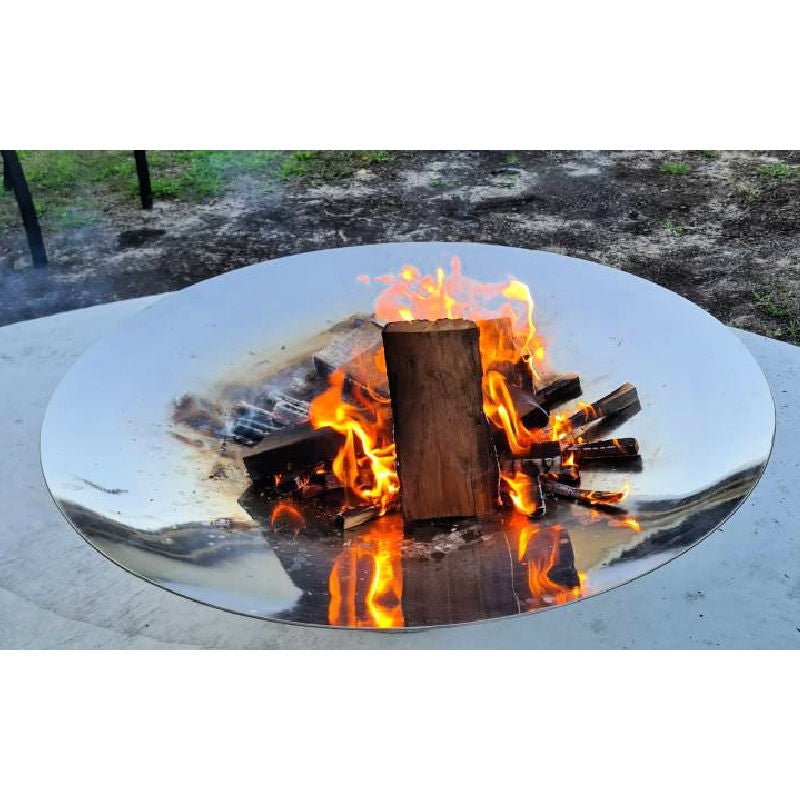Outdoor Fire Pit: The Outdoor Fire Pit and Stinless Steel Grill bundle with fire lit