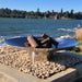 Outdoor Fire Pit: The Outdoor Fire Pit and Stinless Steel Grill bundle close up enar the beach