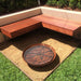 Fire Pit: The Cauldron Hearth with metal BBQ grill in yard