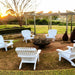 Fire Pit: Mega Cauldron in yard with deck chairs around