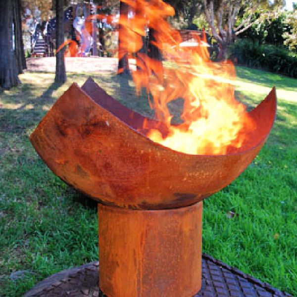 Fire Pit: The Holy Grail in Cast Iron lit close up view